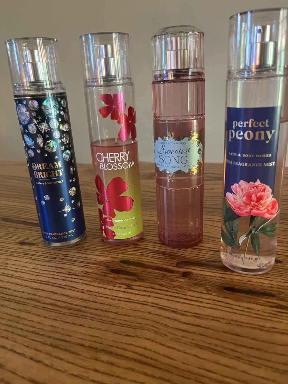 Bath & Body Works Cherry Blossom Fragrance Mist and 3 others.